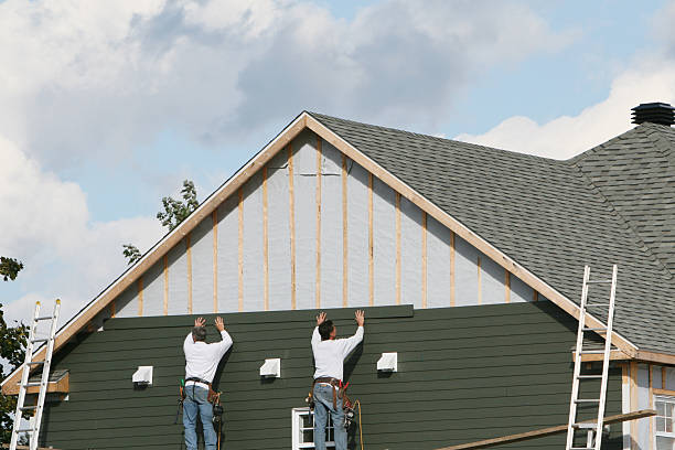 Professional Siding Installation technician working in Reading, PA